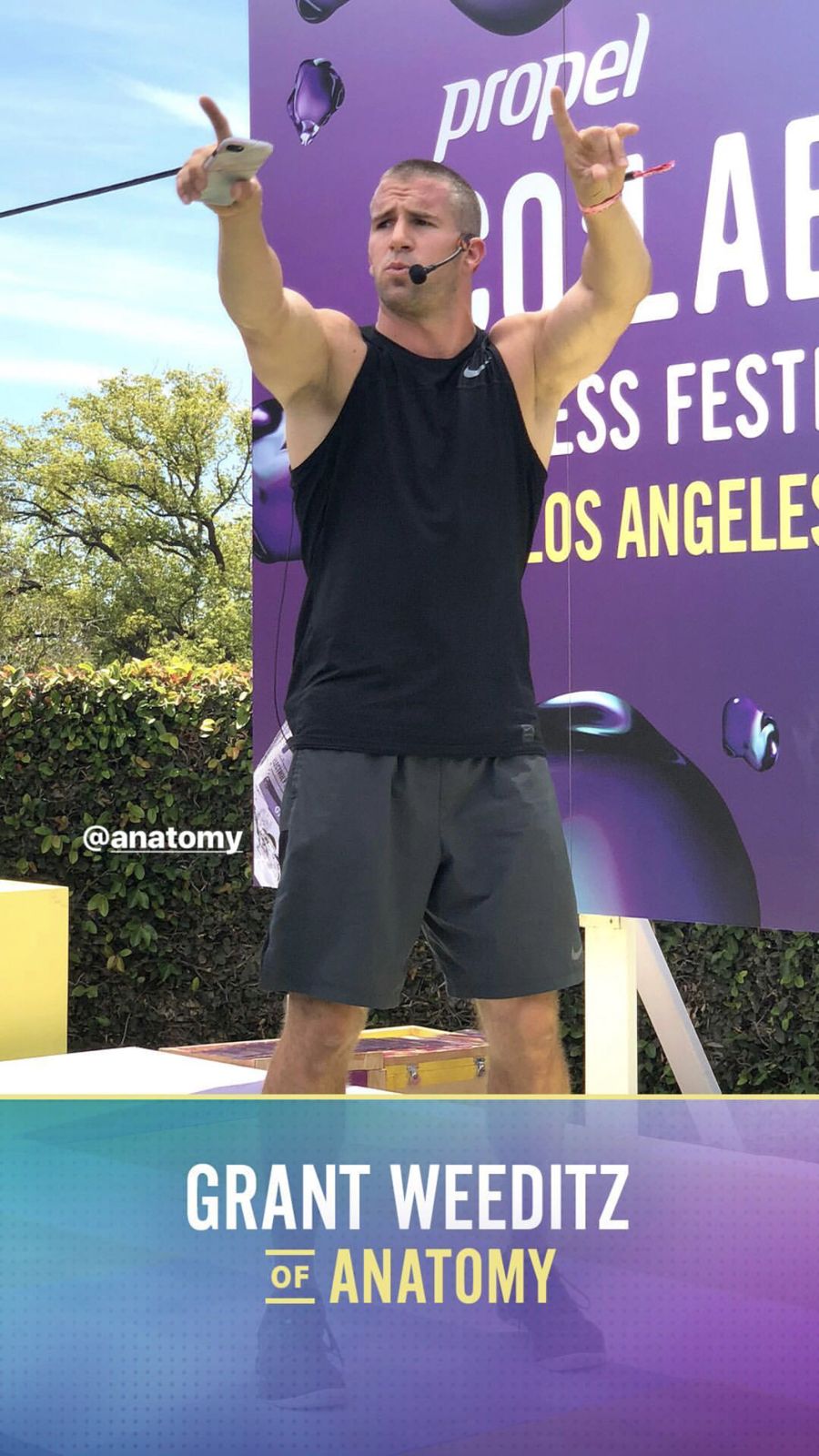 Grant Weeditz on stage at the Propel CO:LABS Fitness Festival in Los Angeles, with an on-screen graphic reading Grant Weeditz of Anatomy