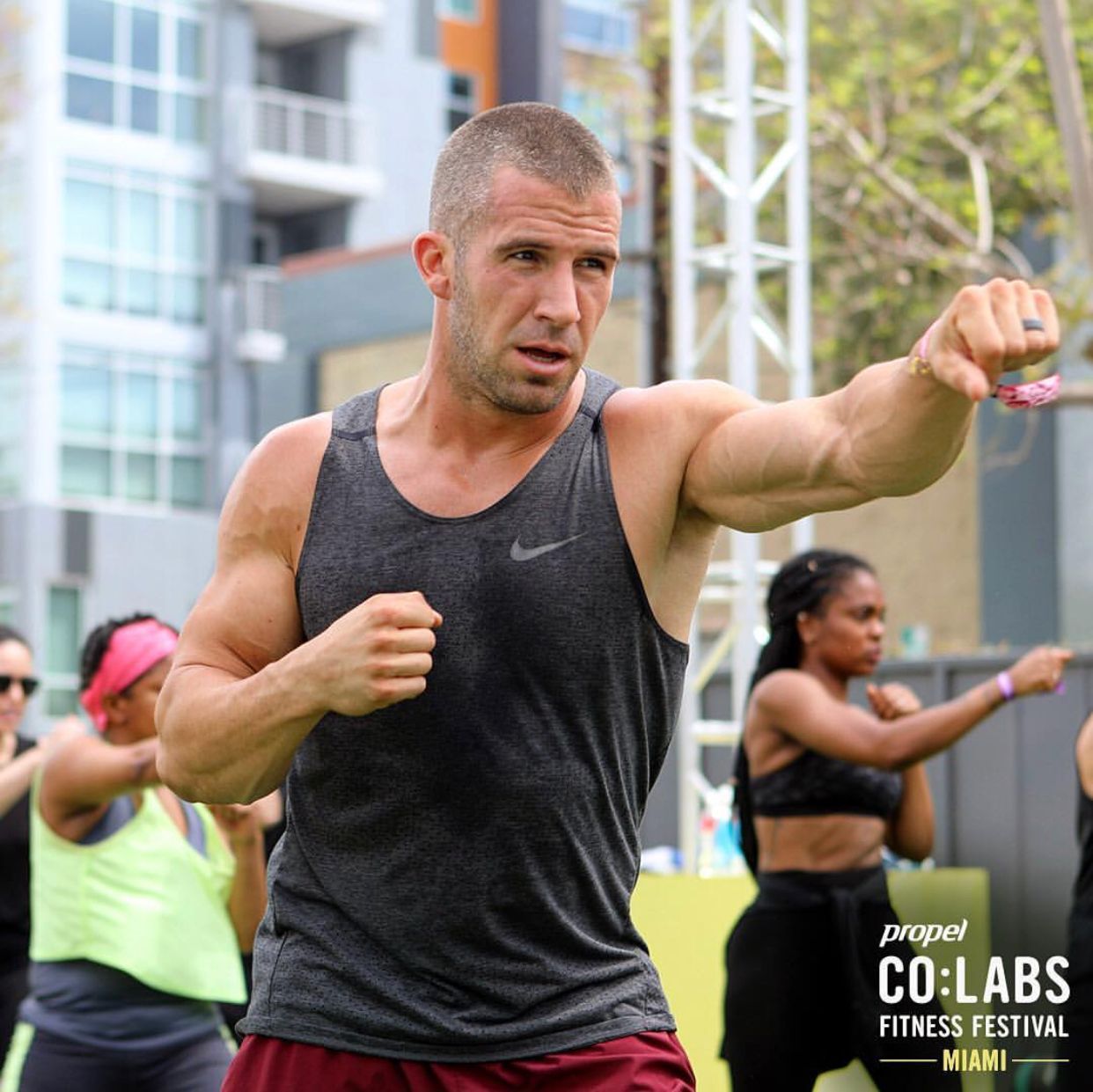 Grant Weeditz coaching a group through shadowboxing at the CO:LABS Fitness Festival in Miami